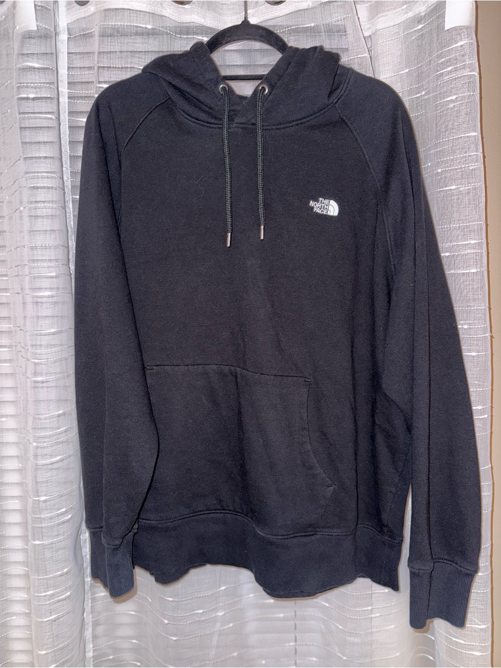 The North Face Black Pullover Hoodie with Small White Logo